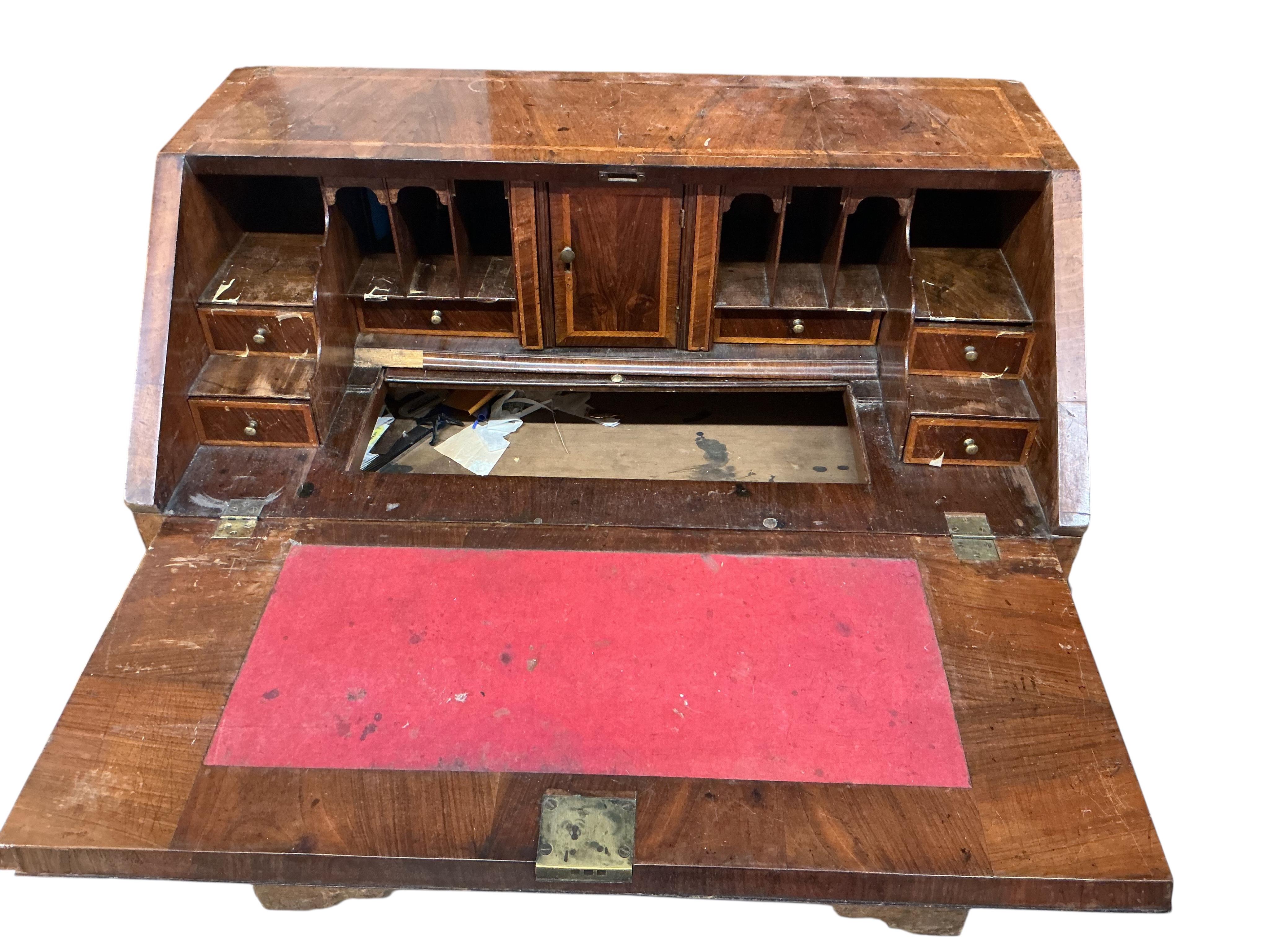 A mid 18th century feather banded walnut bureau, width 91cm, depth 52cm, height 97cm